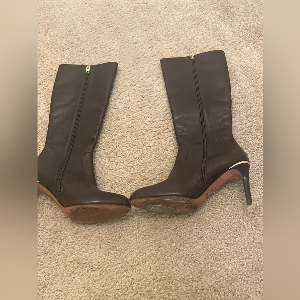 Genuine leather COACH heeled boots.